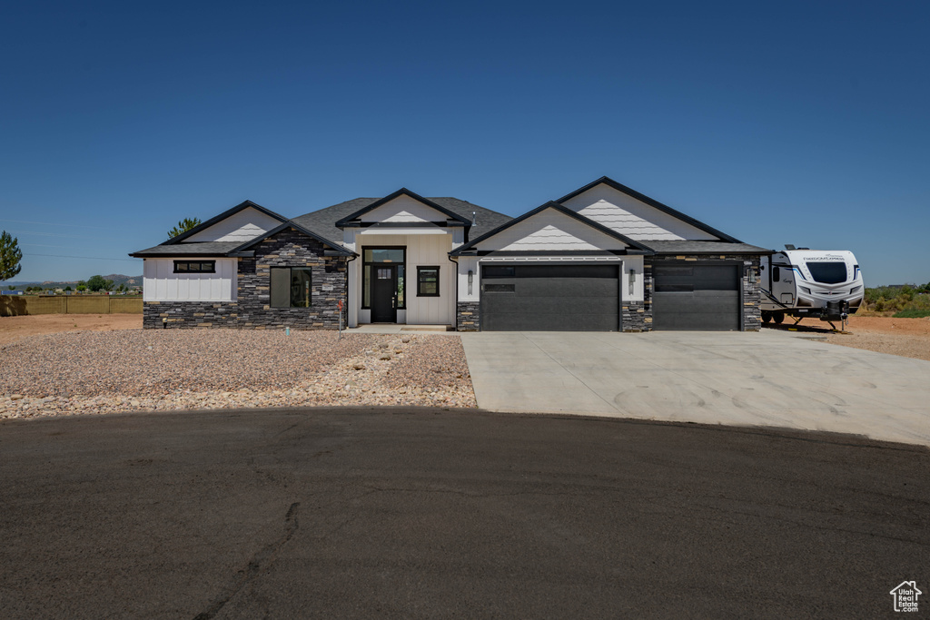 Craftsman-style house featuring a garage