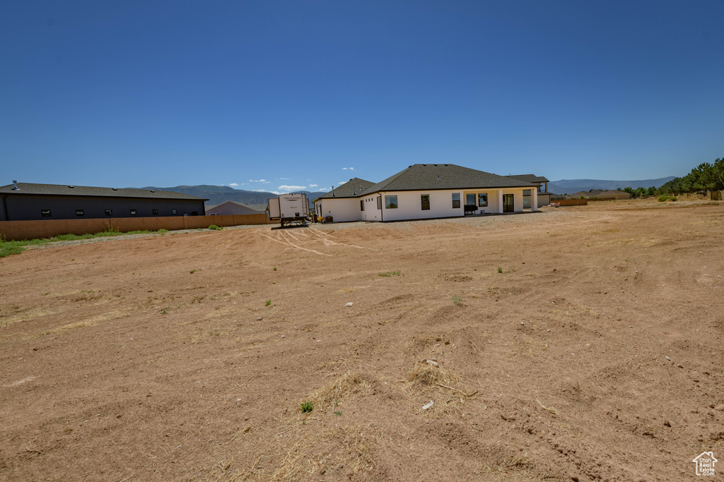 View of yard with a mountain view