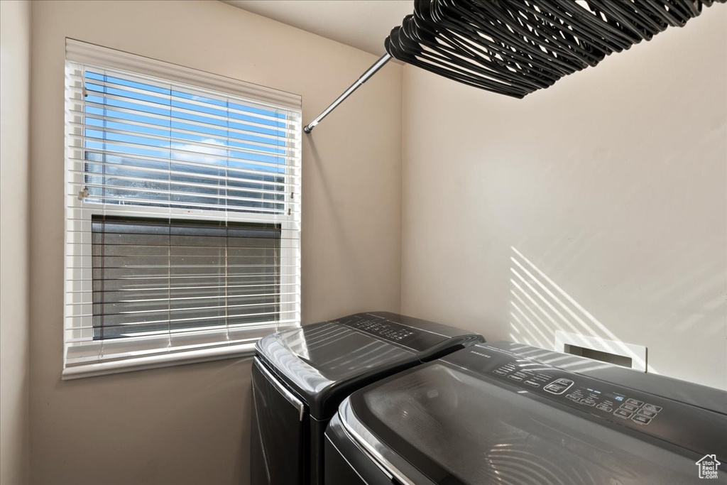 Laundry area featuring independent washer and dryer