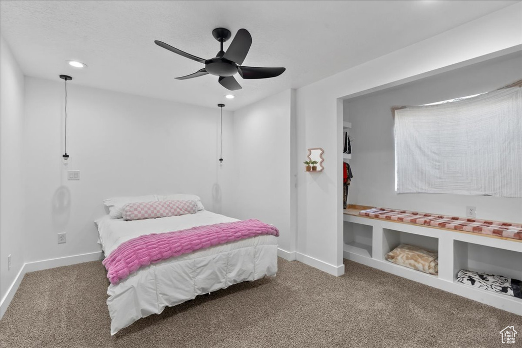 Bedroom with carpet floors and ceiling fan