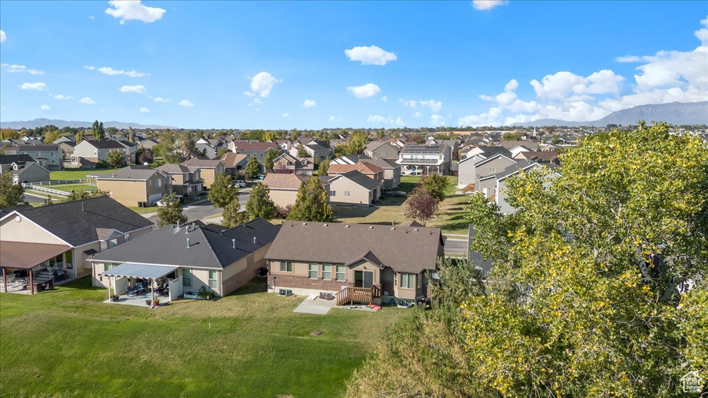 Birds eye view of property with a mountain view