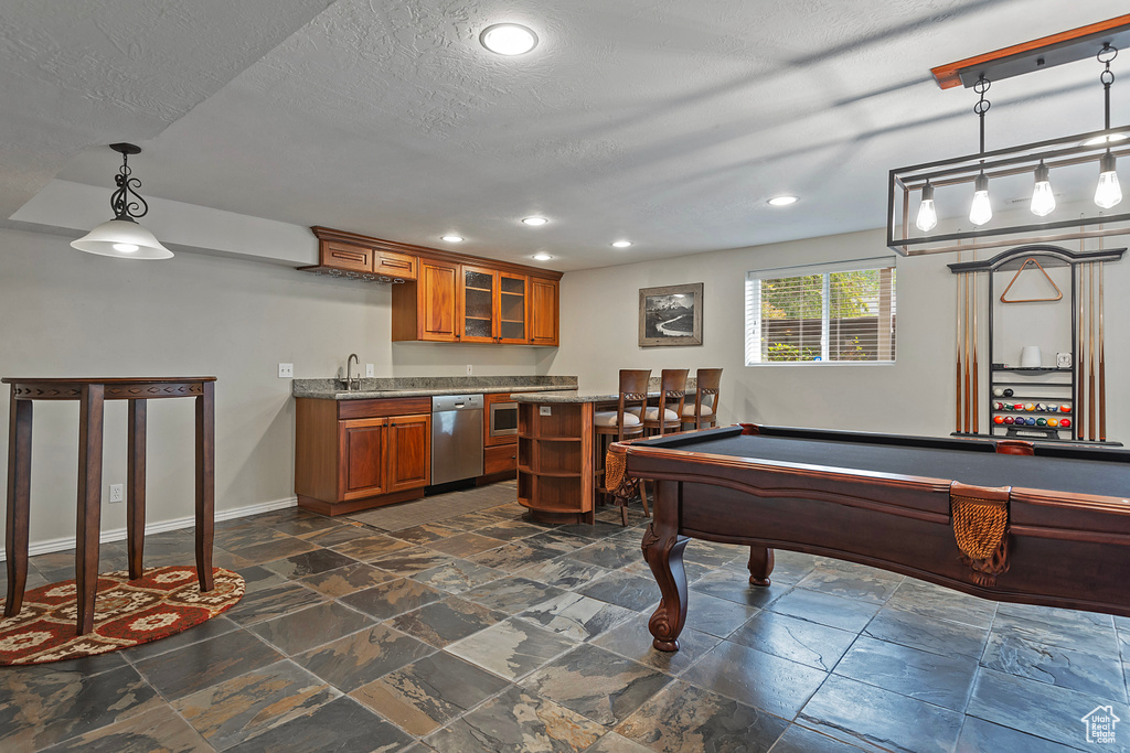 Recreation room with pool table and wet bar