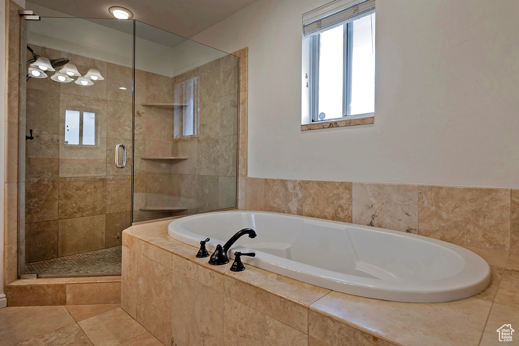 Bathroom featuring independent shower and bath