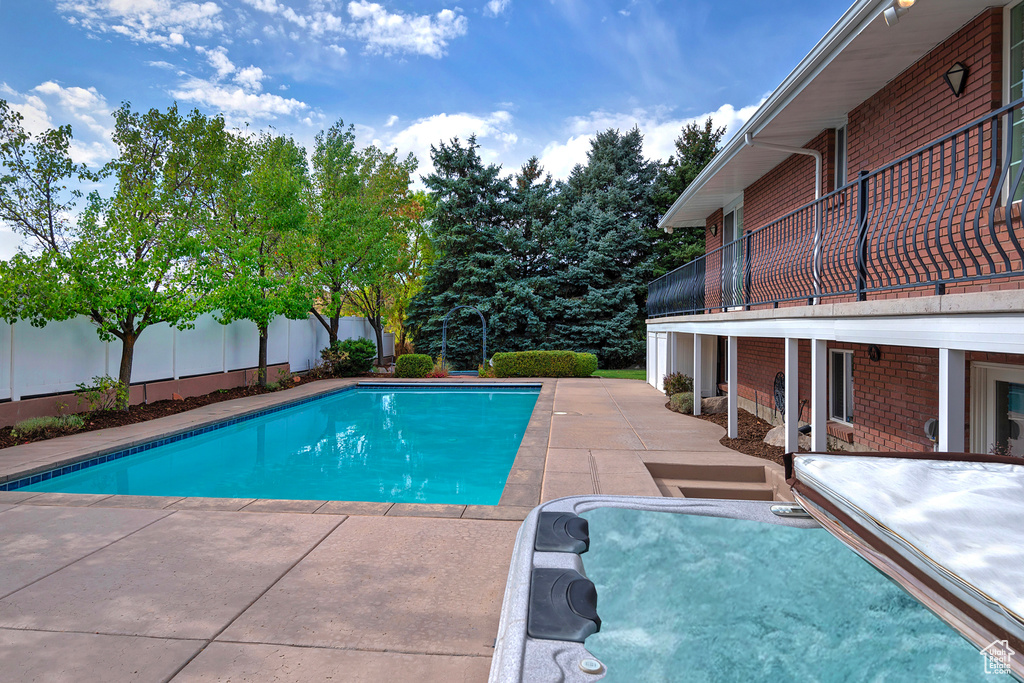 View of pool with a patio