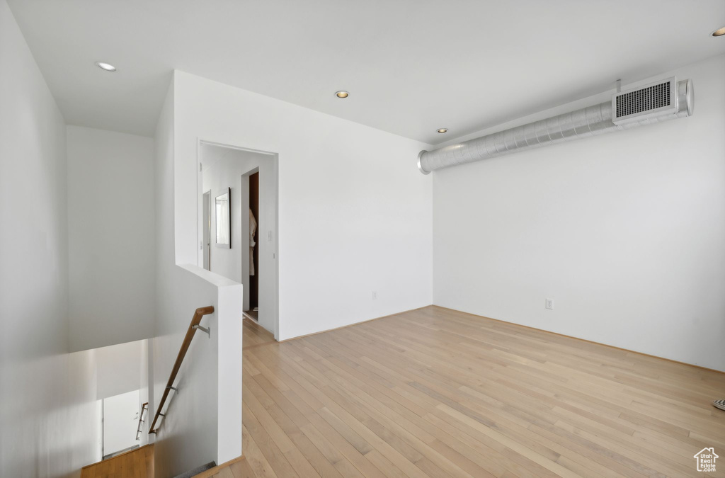 Spare room featuring light wood-type flooring