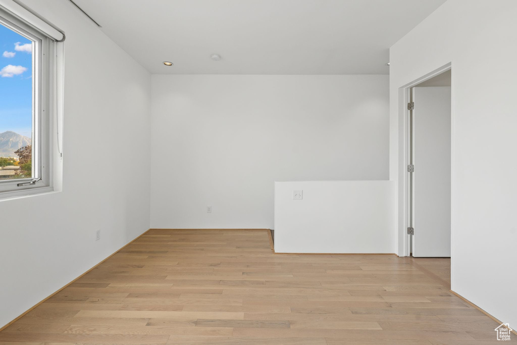 Unfurnished room featuring light hardwood / wood-style flooring