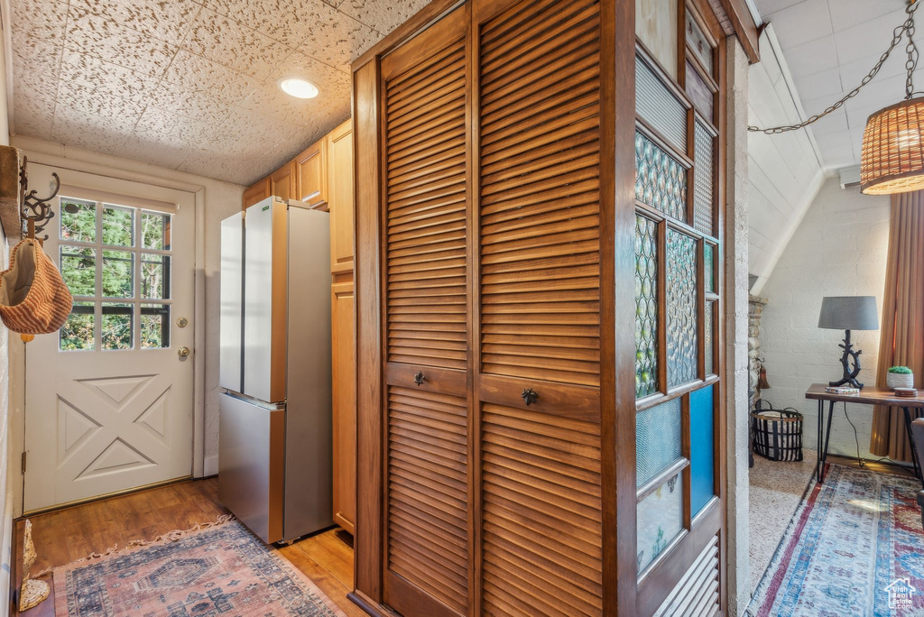 Entryway with light wood-type flooring