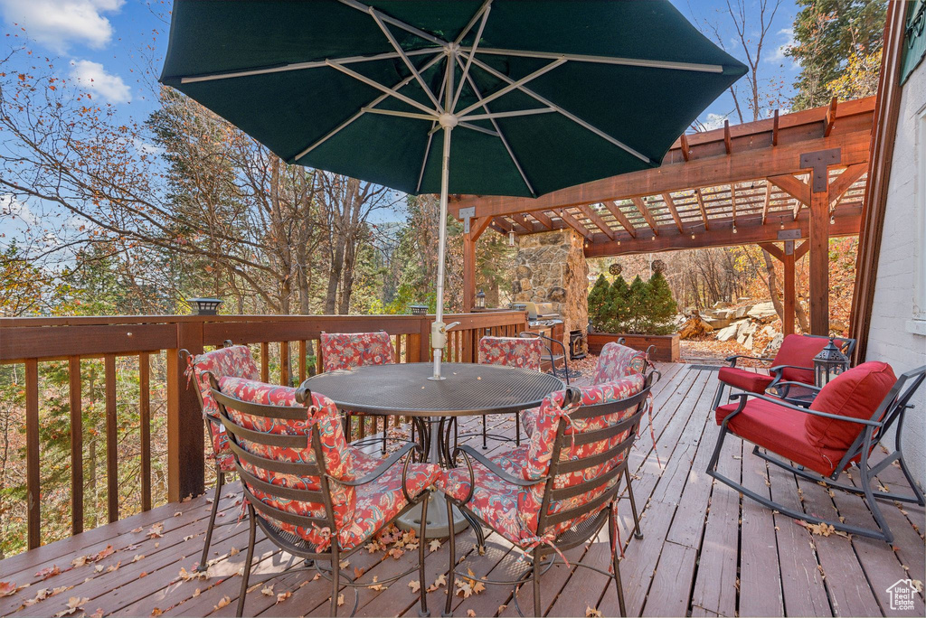 Wooden terrace with a pergola