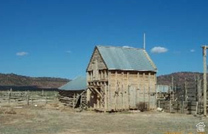 View of outbuilding featuring a mountain view