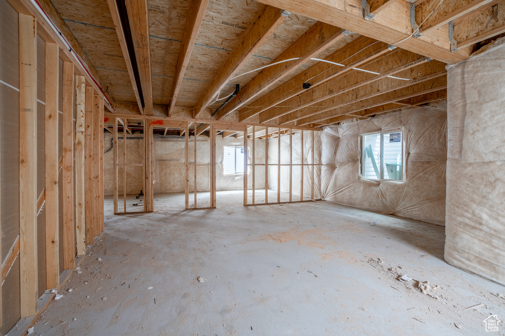 Basement featuring plenty of natural light