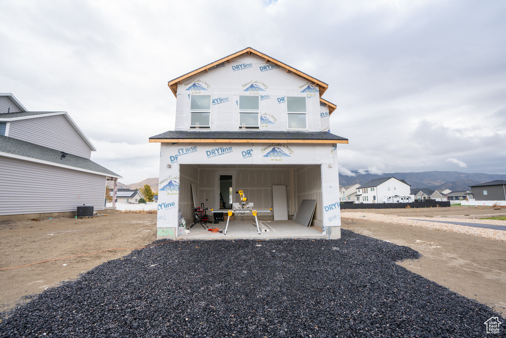 Exterior space with central AC and a mountain view