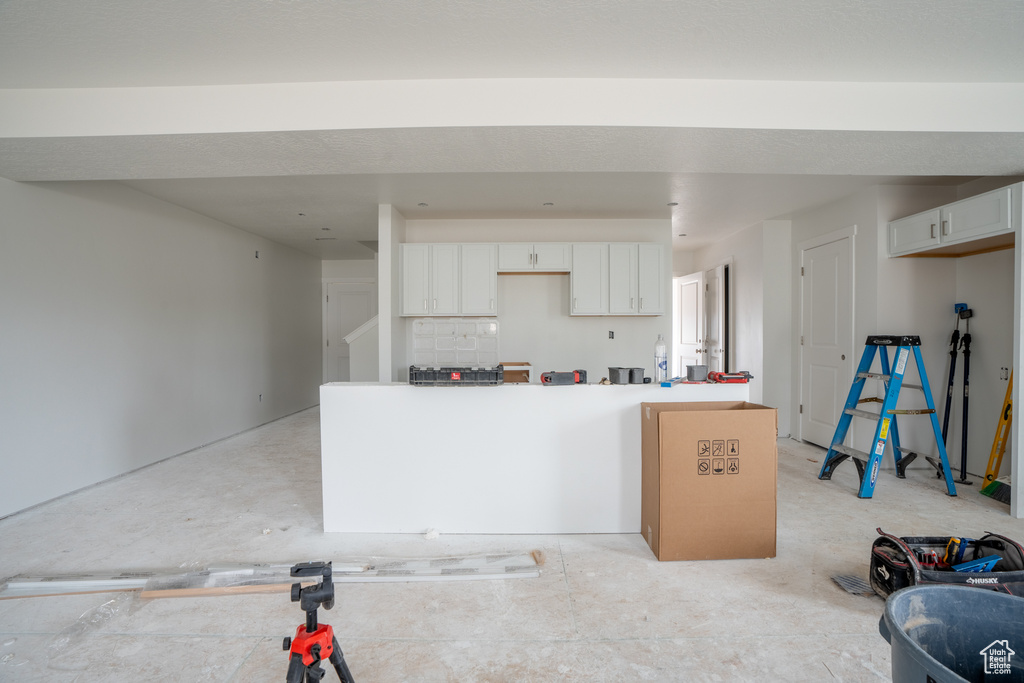 Kitchen with white cabinets