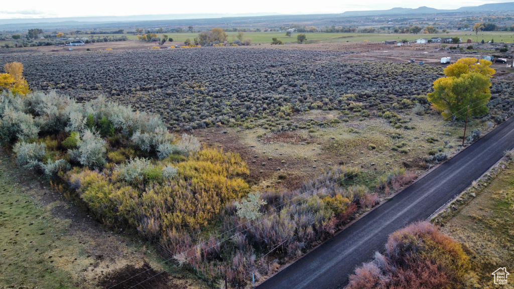 Drone / aerial view featuring a mountain view and a rural view