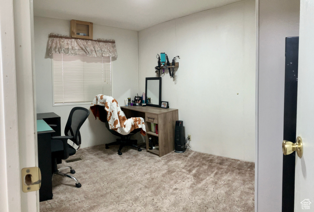 View of carpeted home office