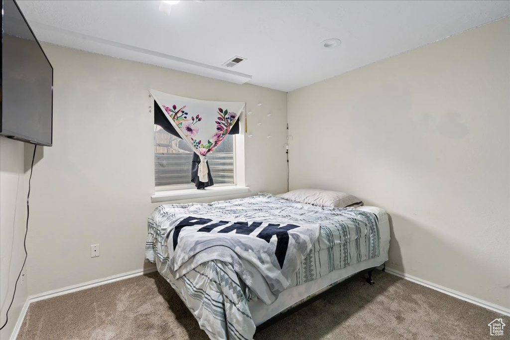 Bedroom featuring carpet floors