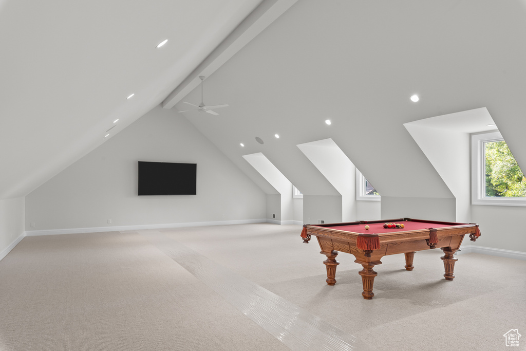 Rec room featuring light carpet, billiards, vaulted ceiling with beams, and ceiling fan