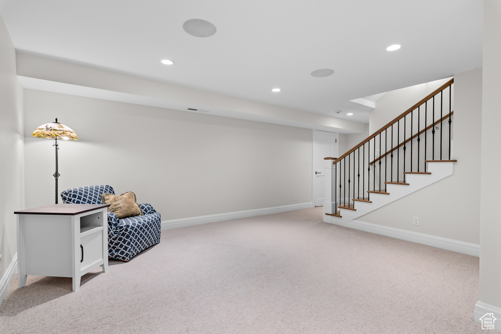 Sitting room with light carpet