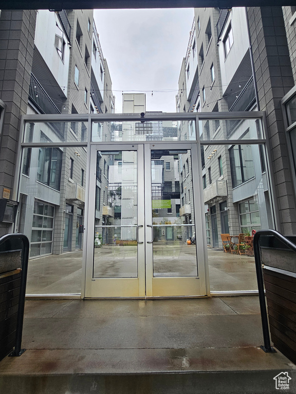 Entrance to property with a balcony