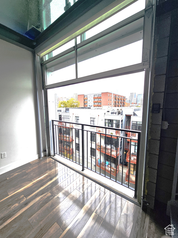 Interior space with dark hardwood / wood-style flooring