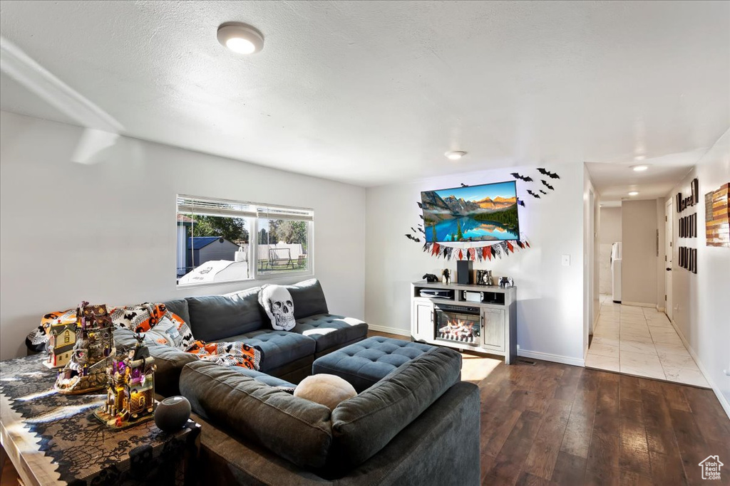 Living room with hardwood / wood-style floors