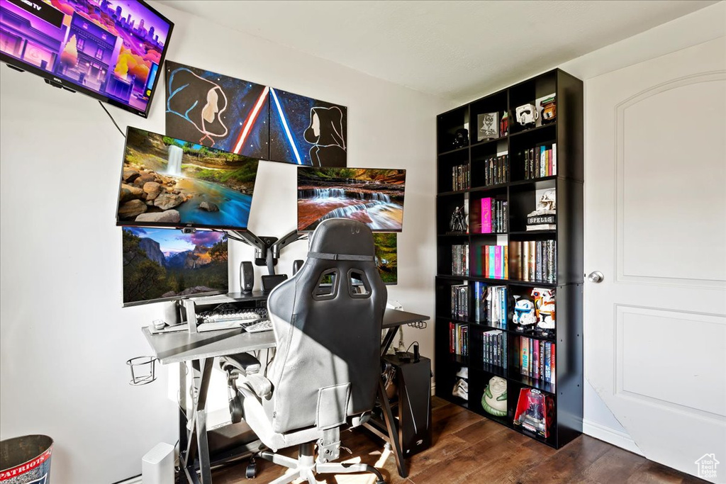 Office area featuring dark hardwood / wood-style flooring