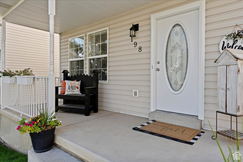 Property entrance featuring a porch