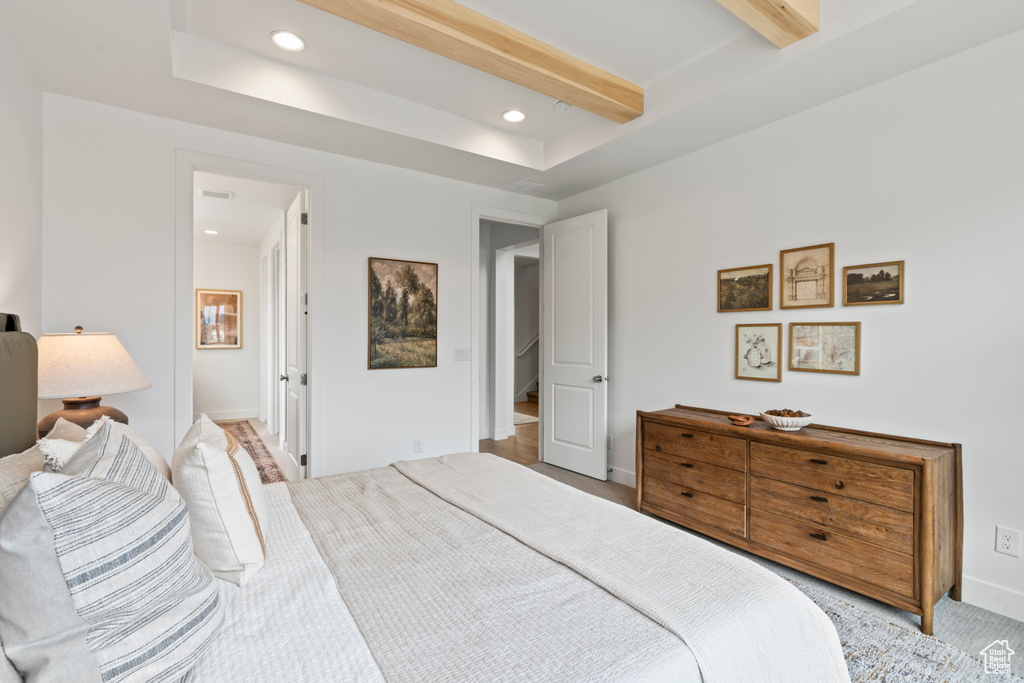 Bedroom with beamed ceiling