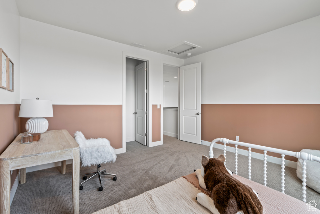 Bedroom with light colored carpet