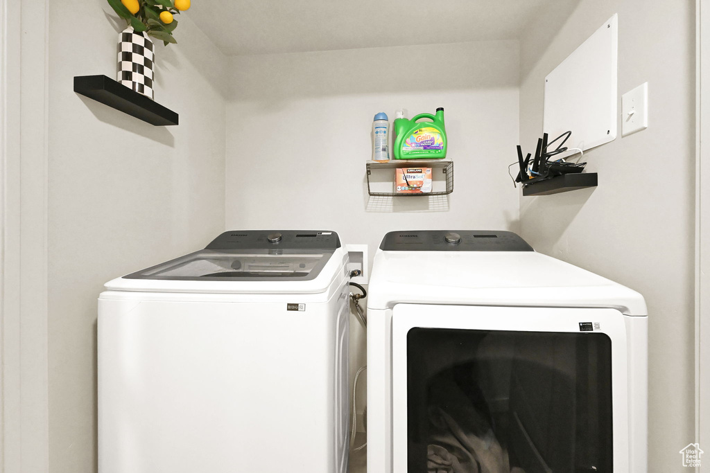 Laundry area with separate washer and dryer