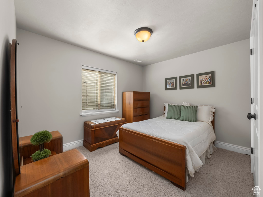 View of carpeted bedroom