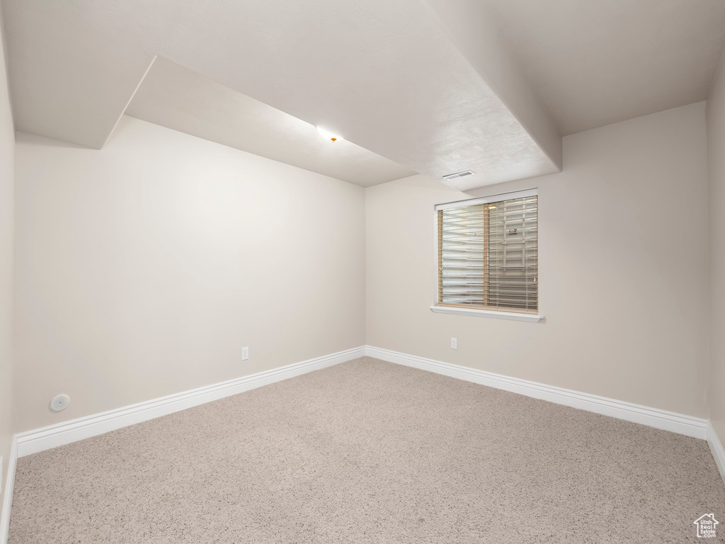 Unfurnished room featuring carpet floors