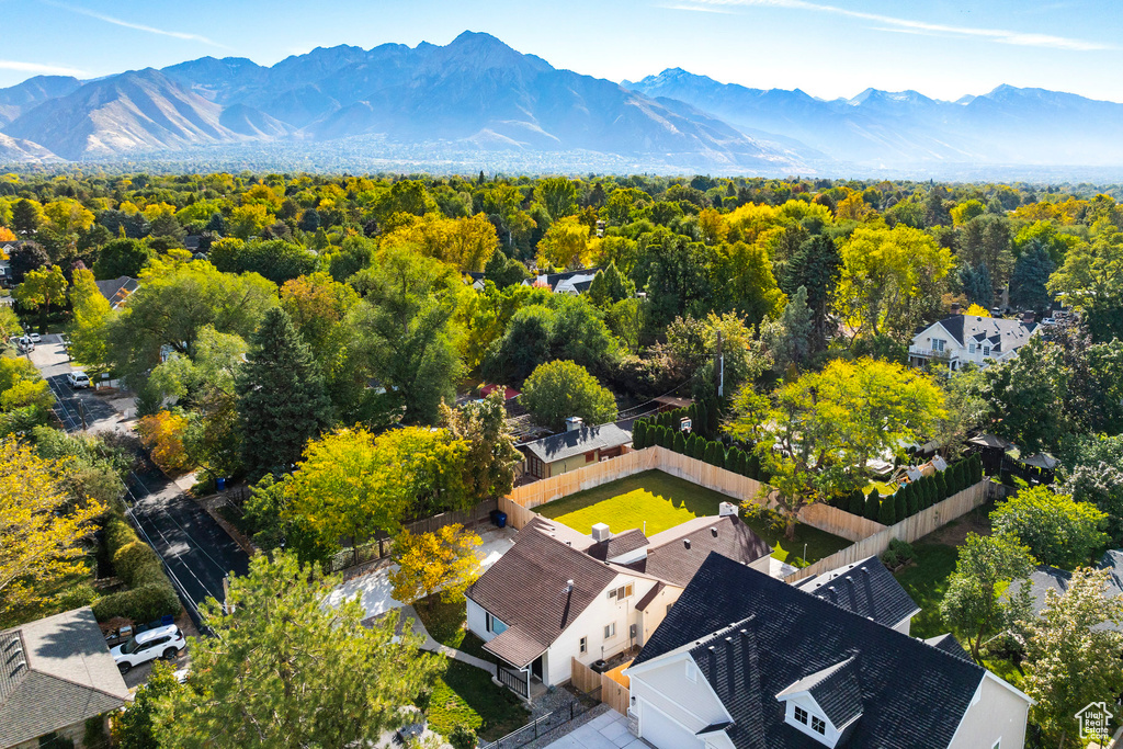 Birds eye view of property with a mountain view