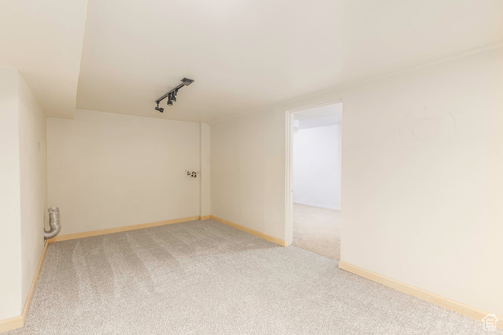 Empty room with carpet flooring