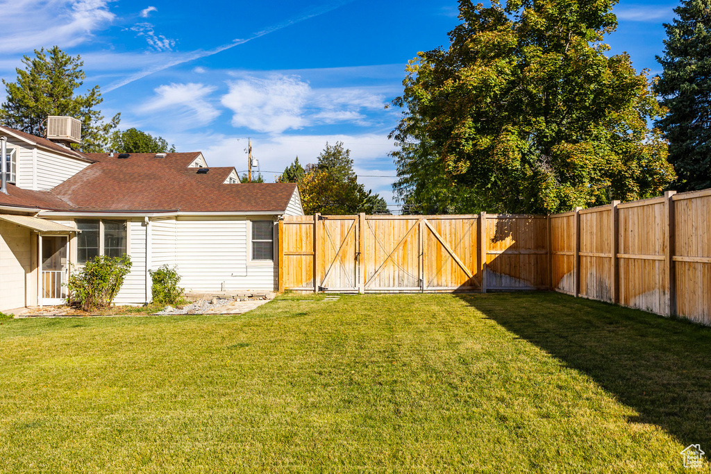 View of yard featuring central AC