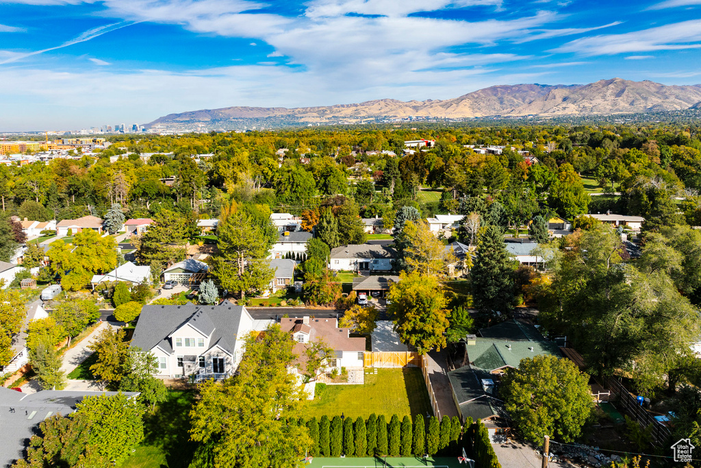 Birds eye view of property with a mountain view