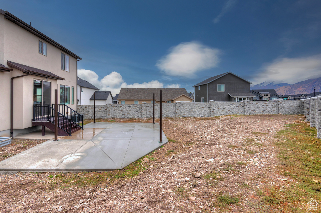 View of yard with a patio area