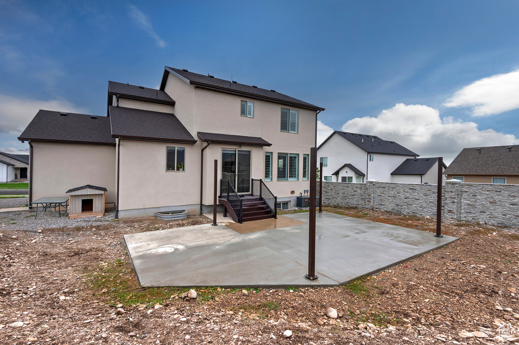 Back of house featuring a patio