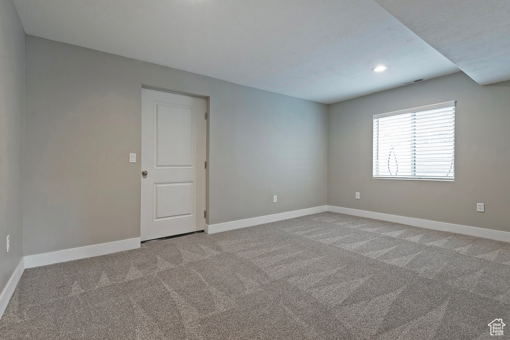 View of carpeted spare room