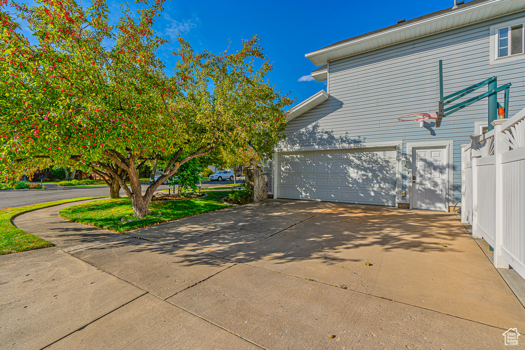 View of home's exterior with a garage