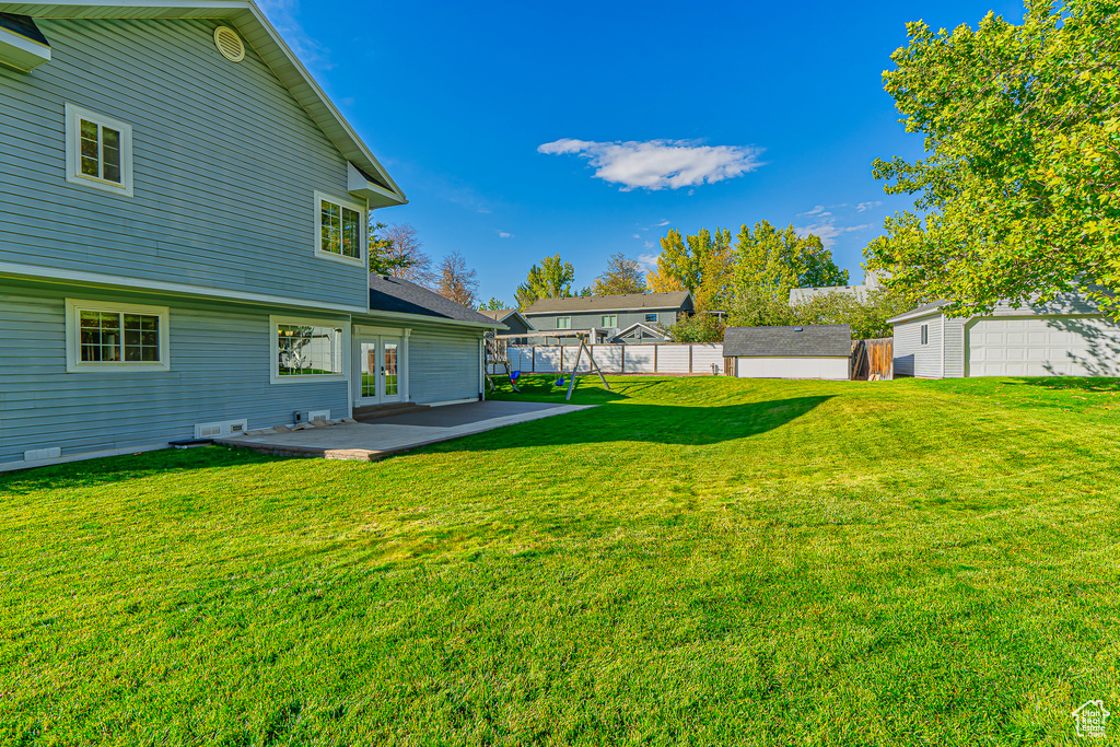 View of yard with a patio