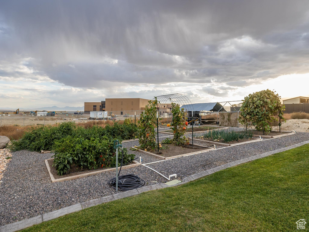 Exterior space featuring a mountain view and a lawn