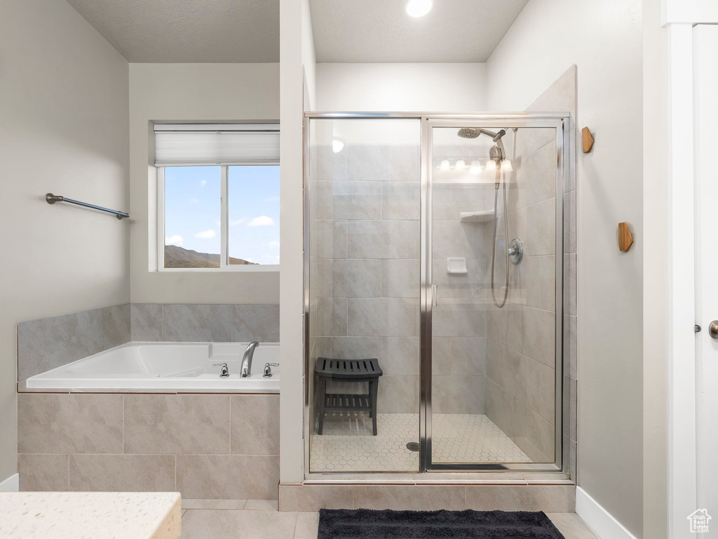 Bathroom with separate shower and tub