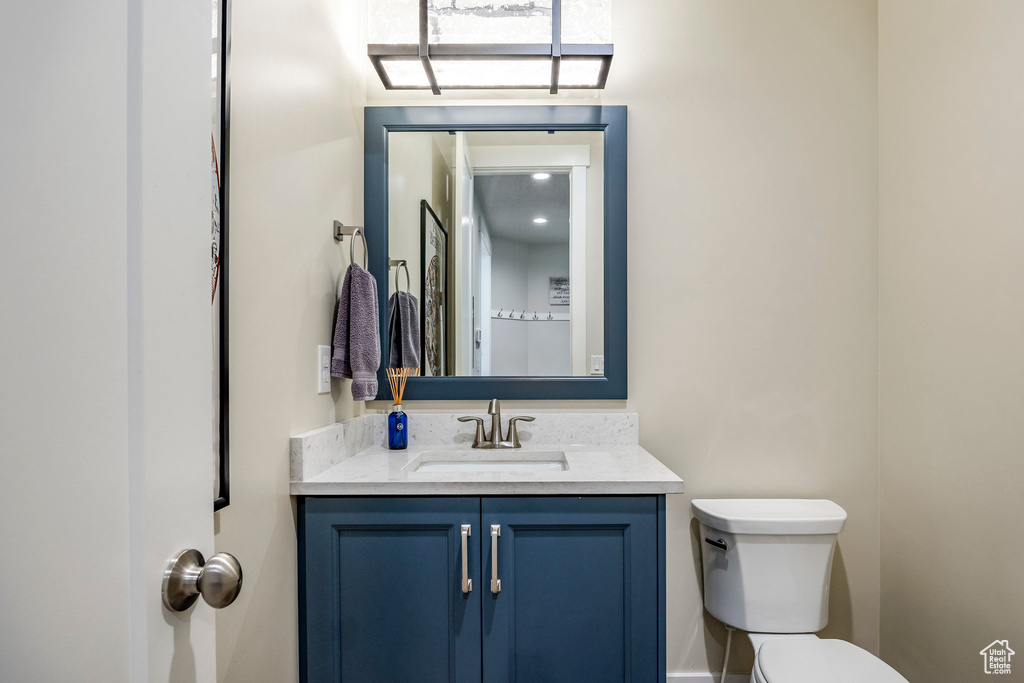 Bathroom with vanity and toilet