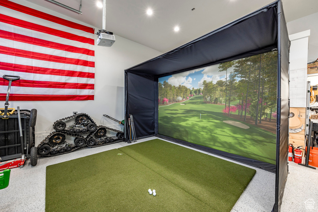 Recreation room with golf simulator