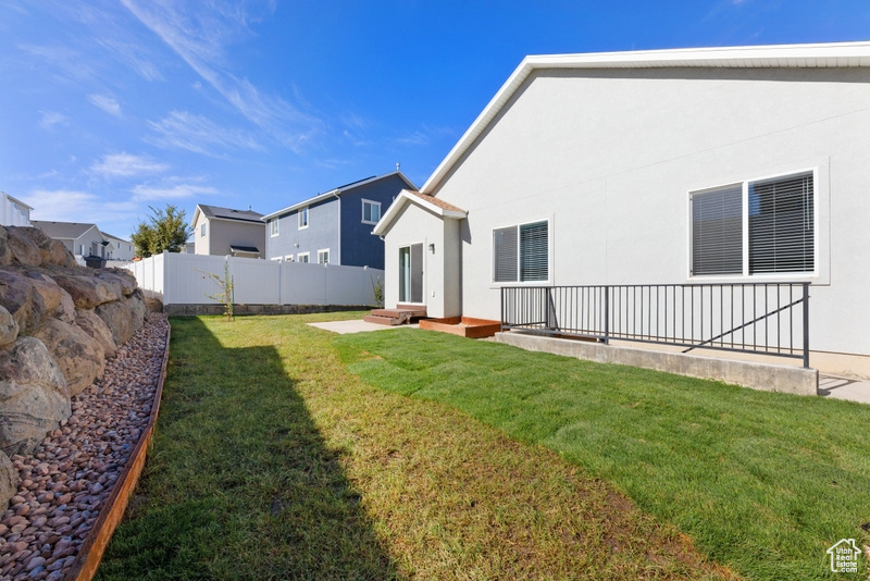 View of yard with a patio