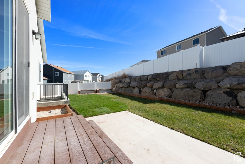 View of yard with a patio area