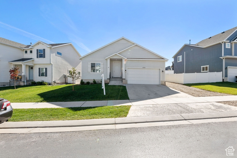 View of front of home featuring a front lawn