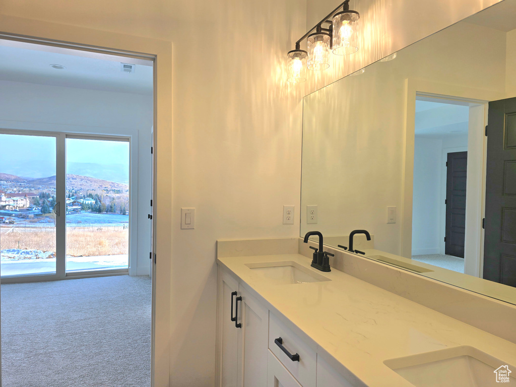 Bathroom featuring a mountain view and vanity
