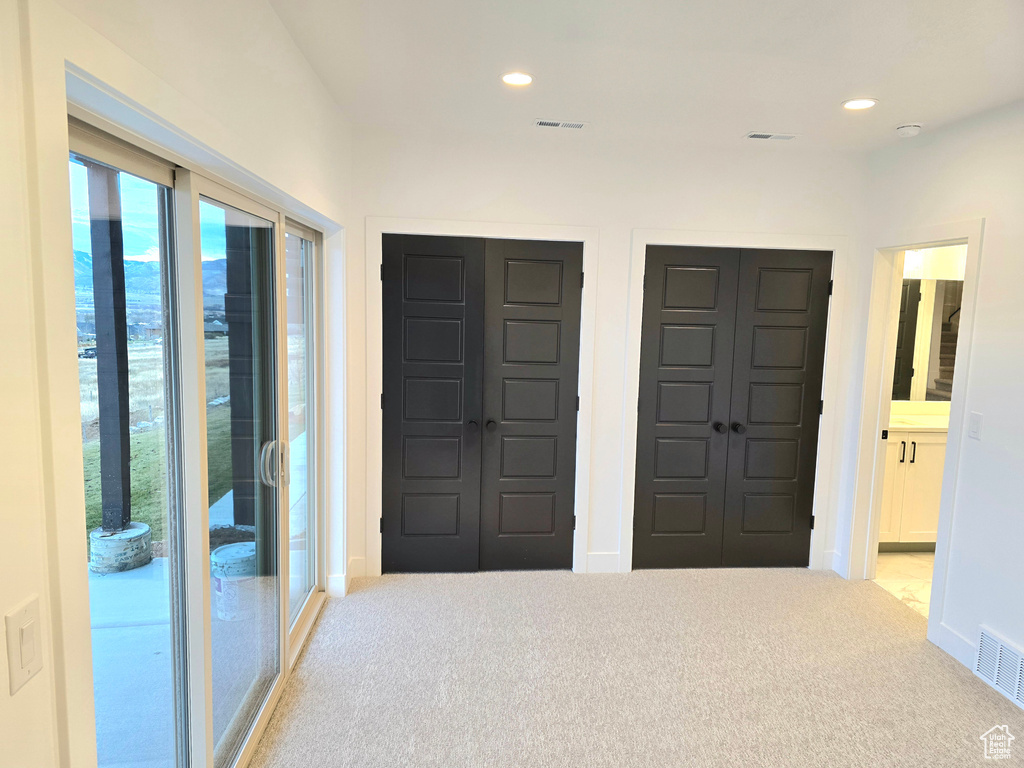 View of carpeted foyer entrance