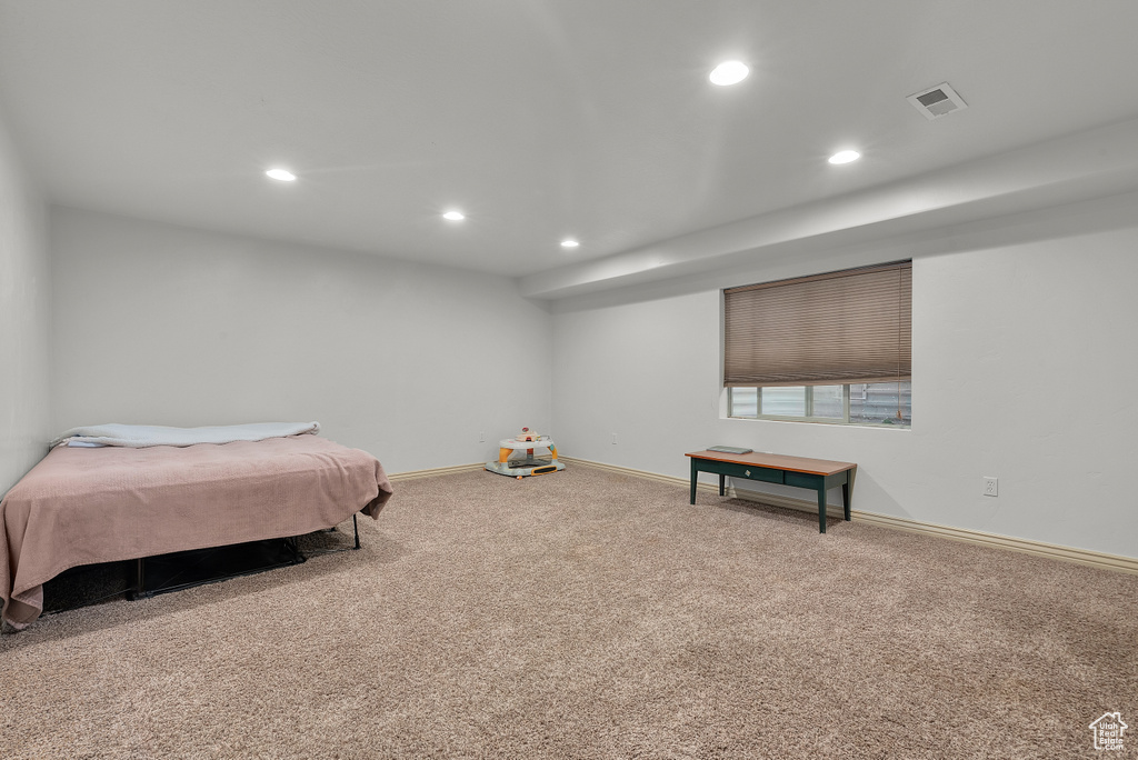 Bedroom featuring carpet